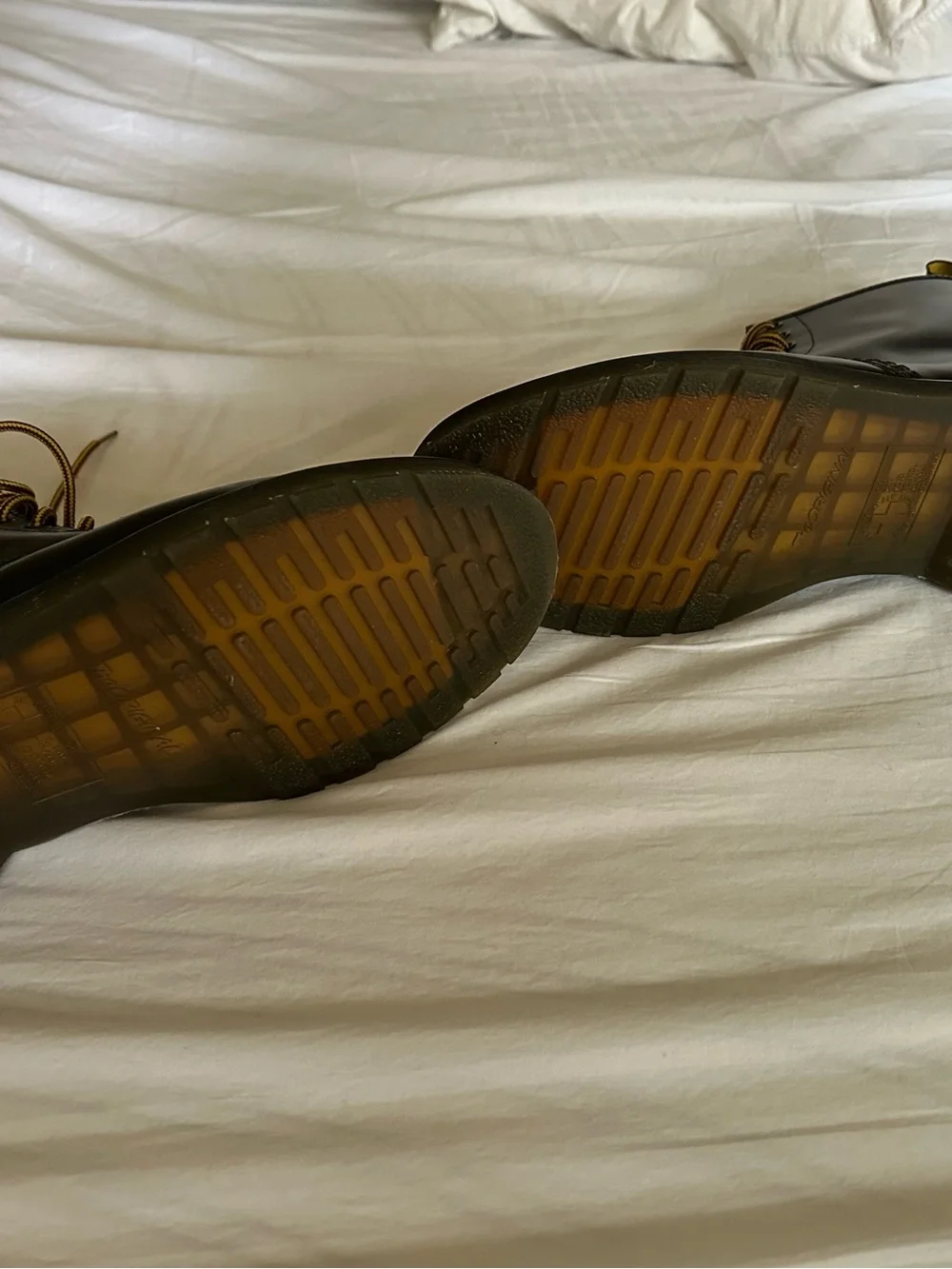 Dr. Martens Black Leather 8-Eye Boots with Yellow Accents